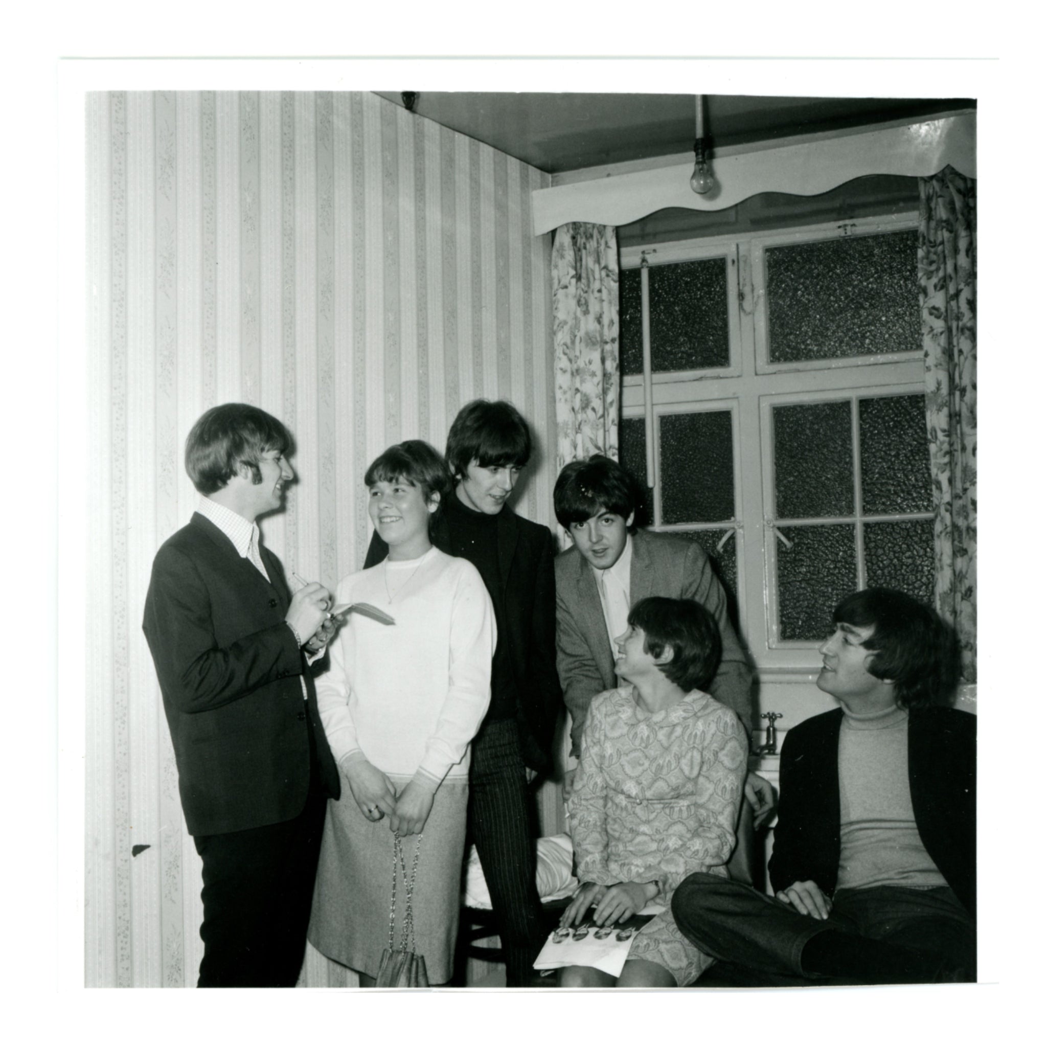 "The Beatles Backstage at the Futurist, Scarborough" — Monochrome photographic print 1980s