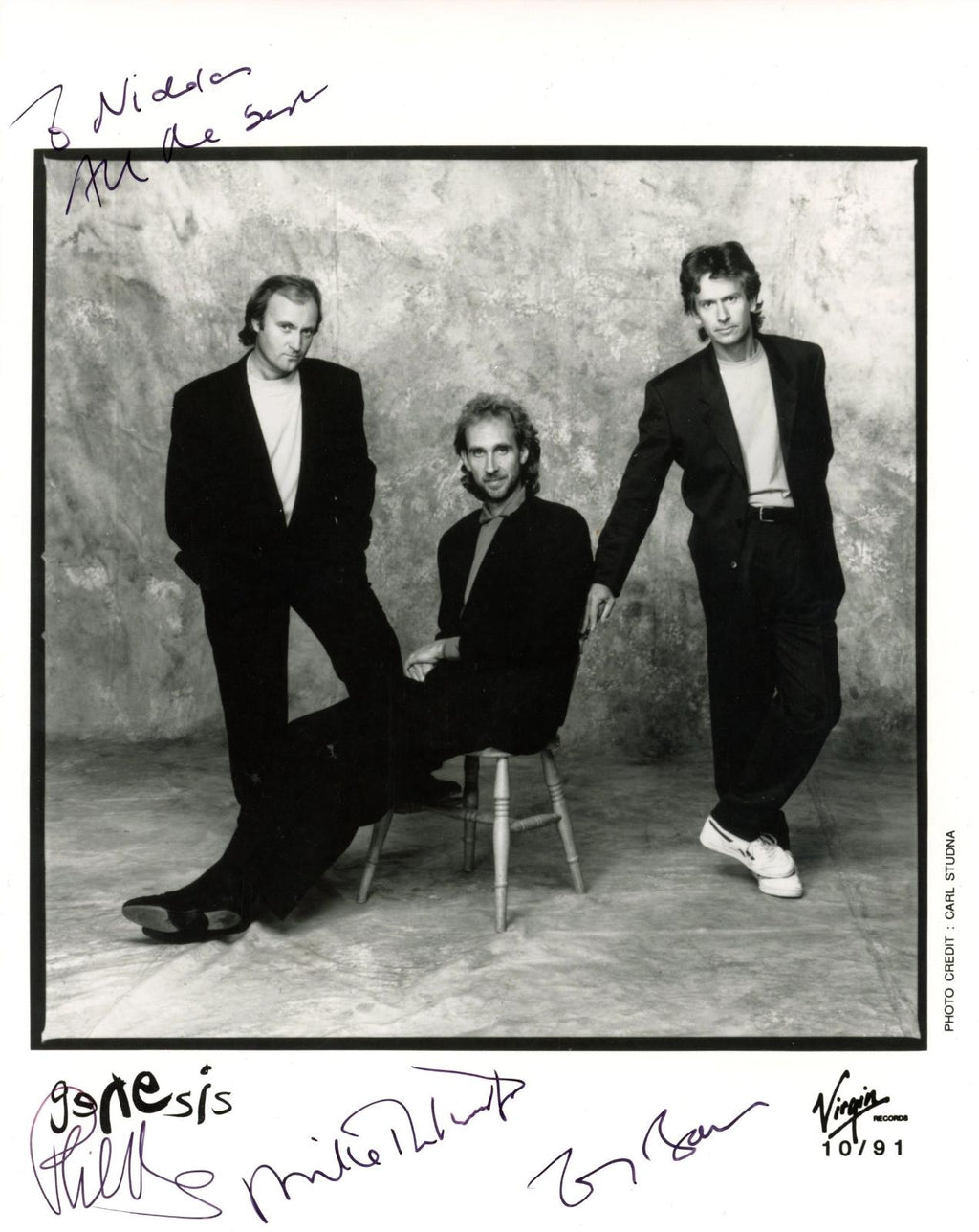 Genesis signed promotional photograph