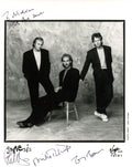 Genesis signed promotional photograph