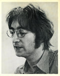 An original cardstock photograph of John Lennon during an interviewed with journalist Steve Turner