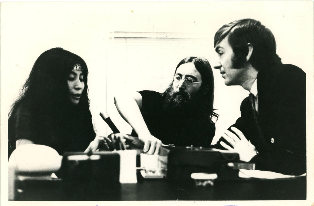 An original press photograph of John Lennon and David Wiggs during the Beatles tapes recordings 1969