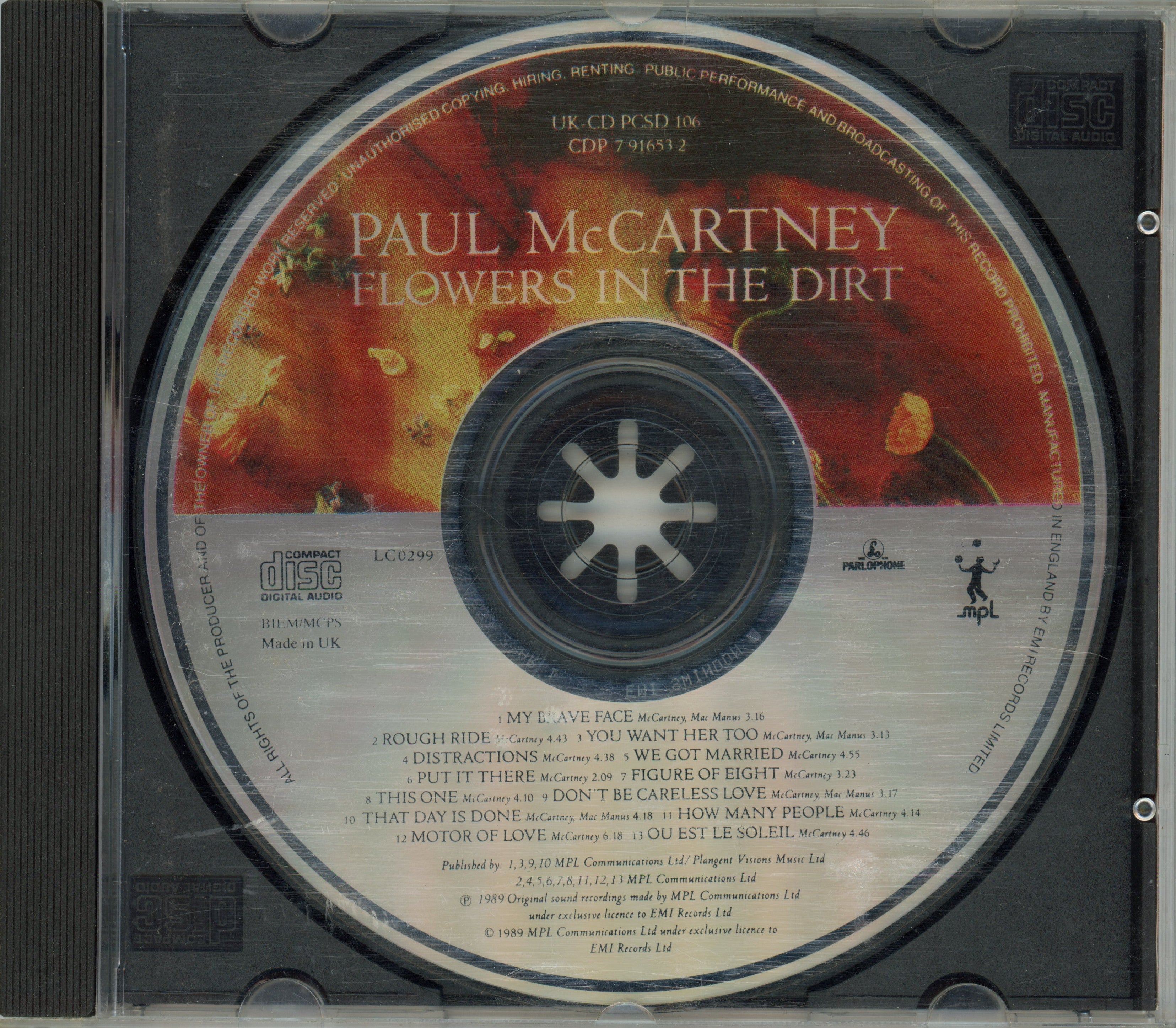Paul and Linda McCartney signed “Flowers in the dirt” CD Booklet