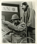 John Lennon and George Harrison Help Photograph