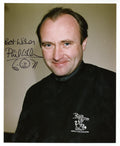 Phil Collins signed and inscribed photograph
