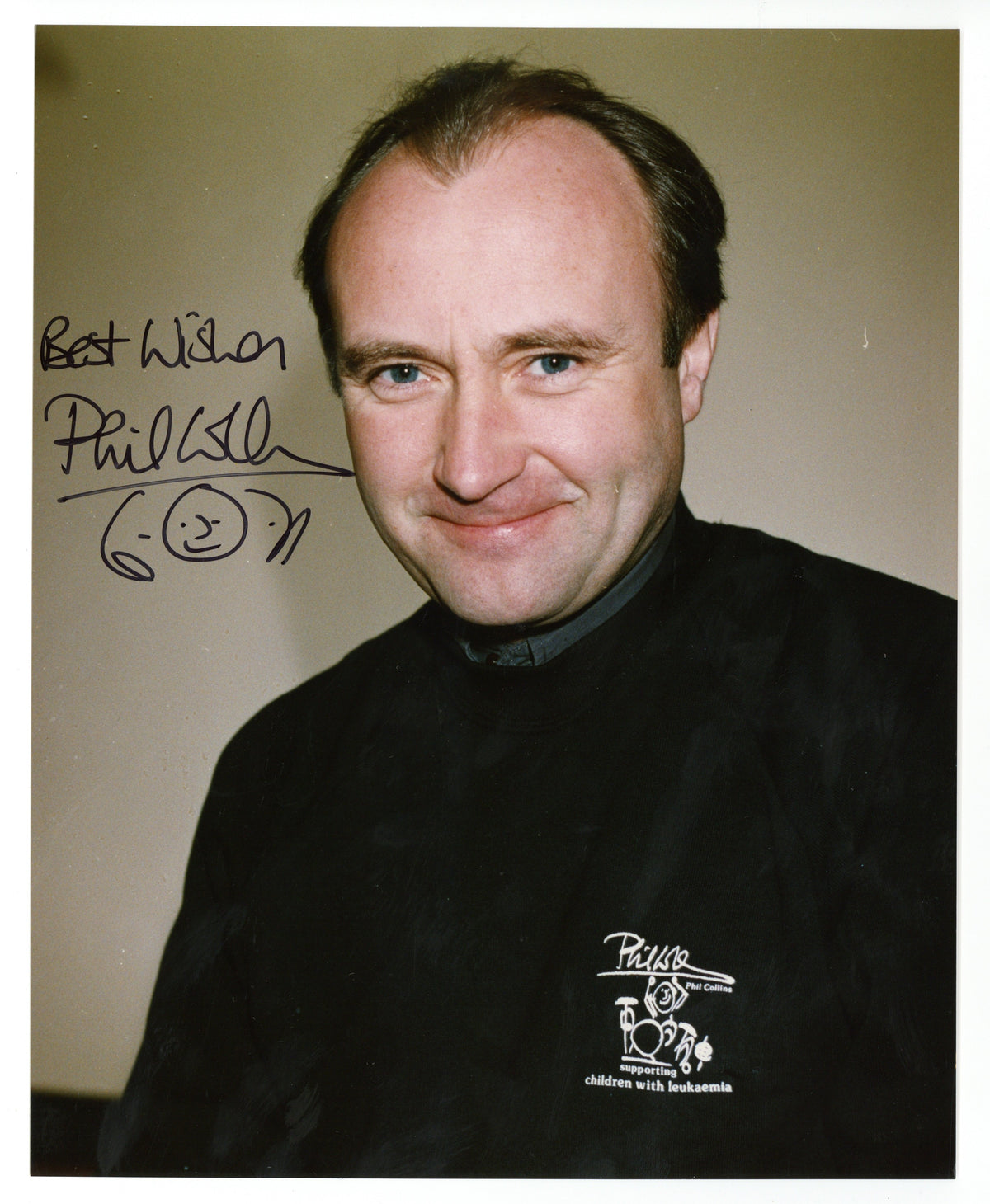Phil Collins signed and inscribed photograph