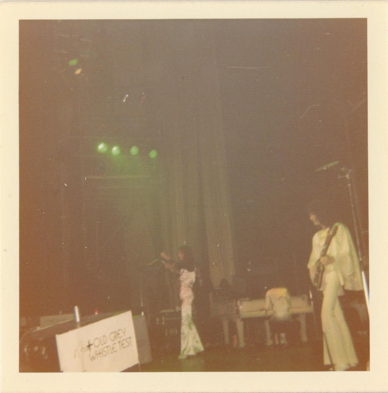 Vintage snapshot of Queen on stage 24th December 1975
