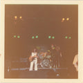 Vintage snapshot of Queen on stage 24th December 1975