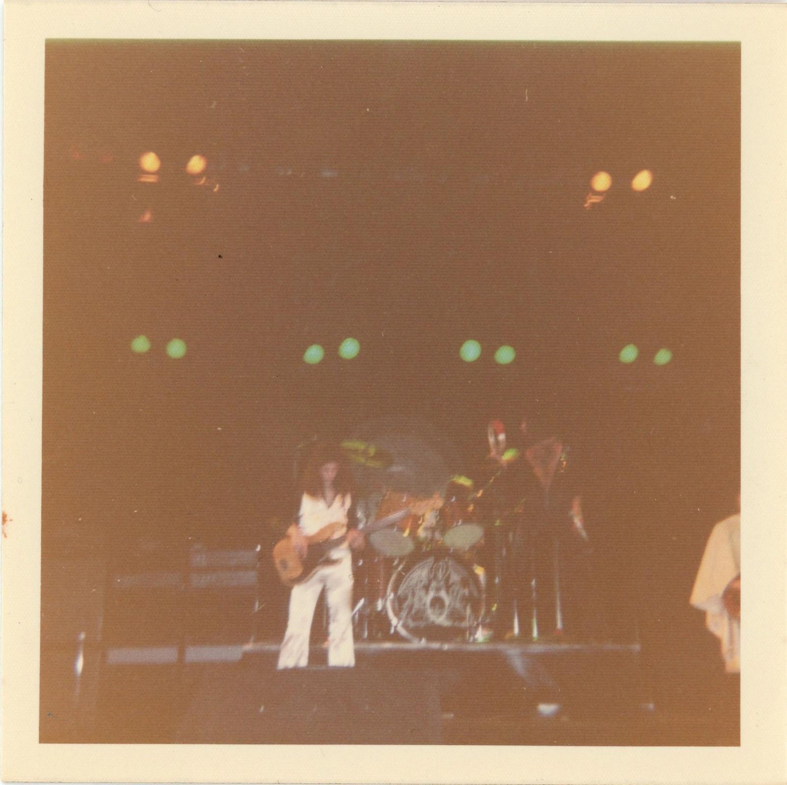 Vintage snapshot of Queen on stage 24th December 1975