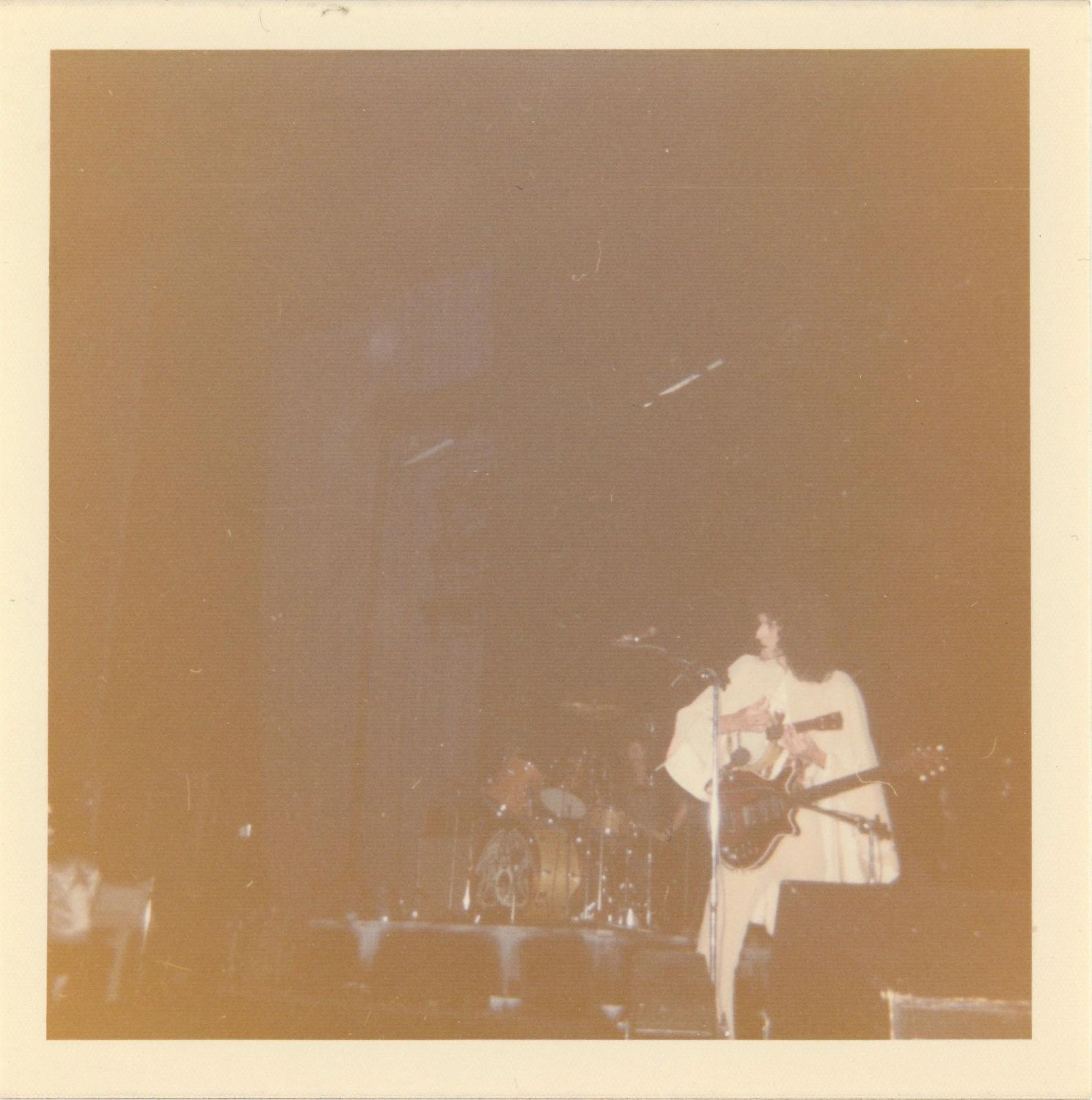 Vintage snapshot of Queen on stage 24th December 1975
