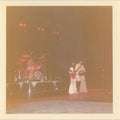 Vintage snapshot of Queen on stage 24th December 1975