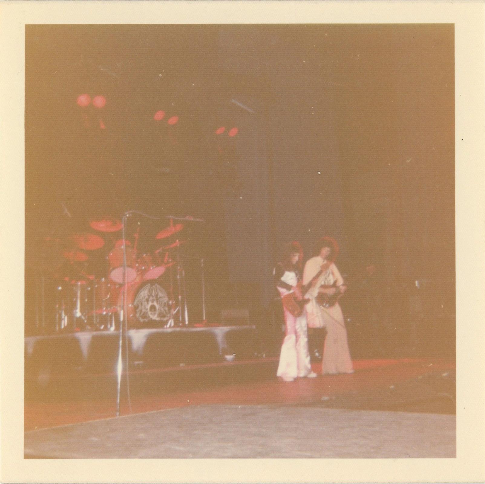Vintage snapshot of Queen on stage 24th December 1975